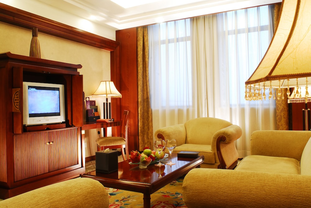 Suite Deluxe con 1 cama King del hotel Grand Mercure Xian Renmin Square. Foto 2