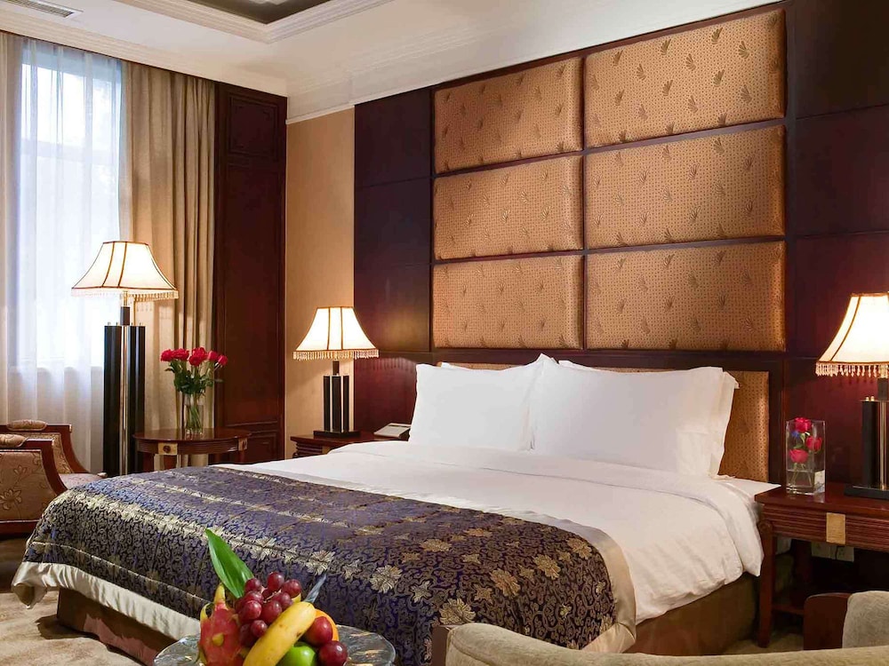 Suite Deluxe con 1 cama King del hotel Grand Mercure Xian Renmin Square. Foto 3
