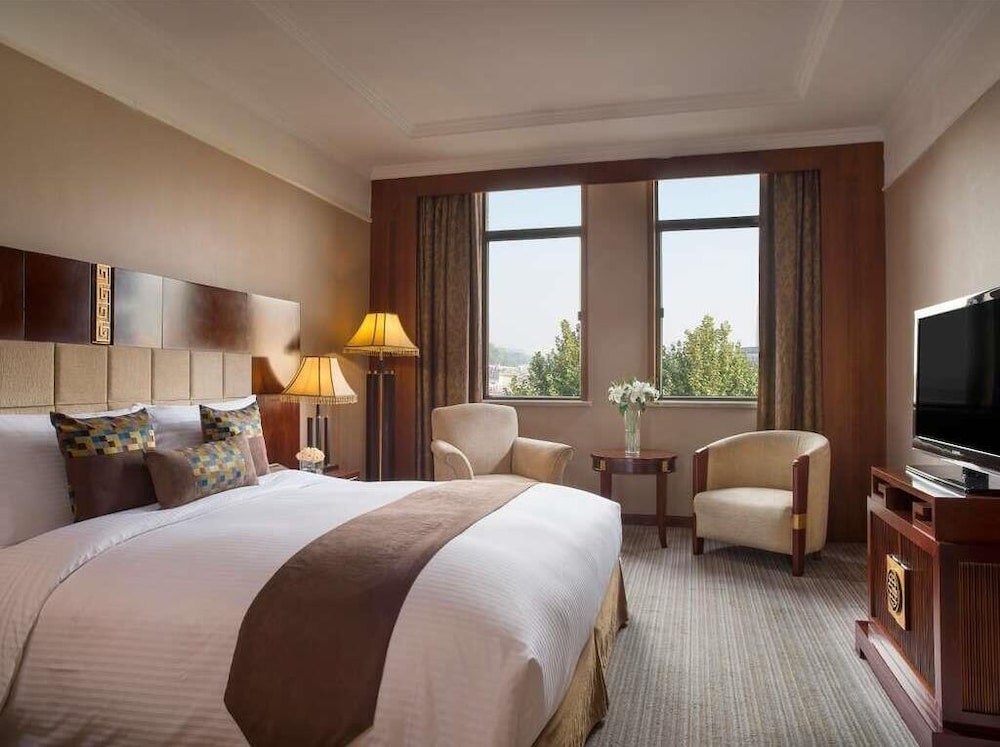 Suite Deluxe con 1 cama King del hotel Grand Mercure Xian Renmin Square. Foto 4