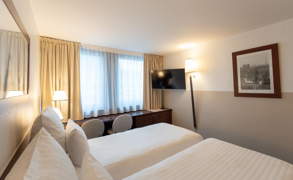 Habitación Clásica - 2 camas individuales del hotel Mercure Paris Gare Montparnasse TGV. Foto 2