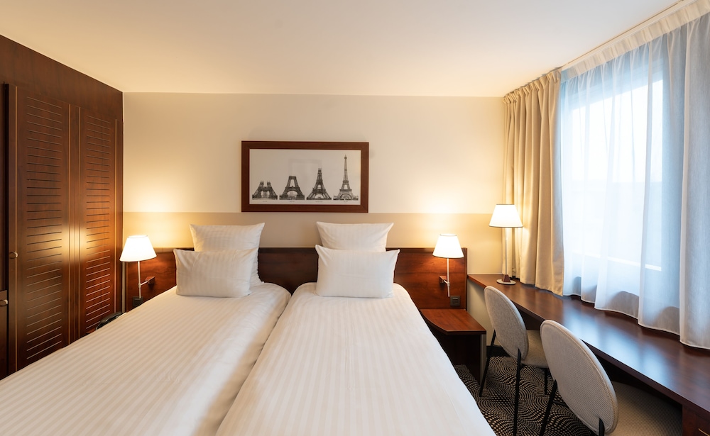 Habitación Clásica - 2 camas individuales del hotel Mercure Paris Gare Montparnasse TGV. Foto 4