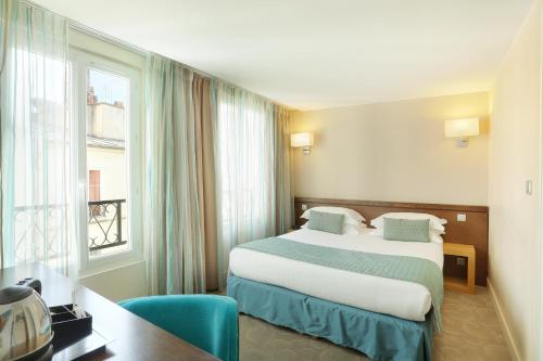 Habitación Doble del hotel Le Grand Hôtel de Normandie. Foto 5