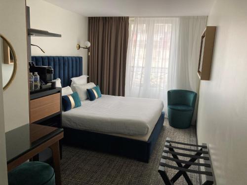 Habitación Doble Confort del hotel Le Grand Hôtel de Normandie. Foto 5