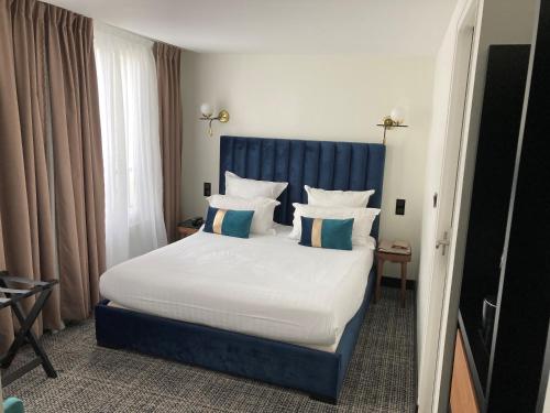 Habitación Doble Confort del hotel Le Grand Hôtel de Normandie. Foto 8