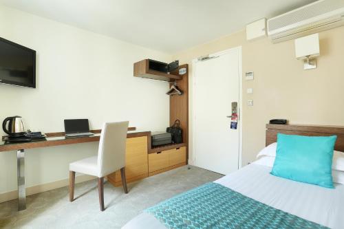 Habitación Individual del hotel Le Grand Hôtel de Normandie. Foto 6