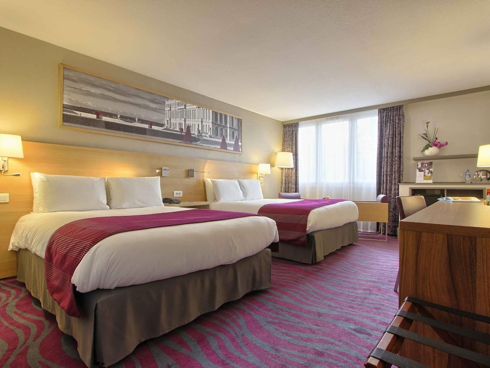 Habitación Clásica - 2 camas dobles del hotel Mercure Paris Velizy. Foto 1