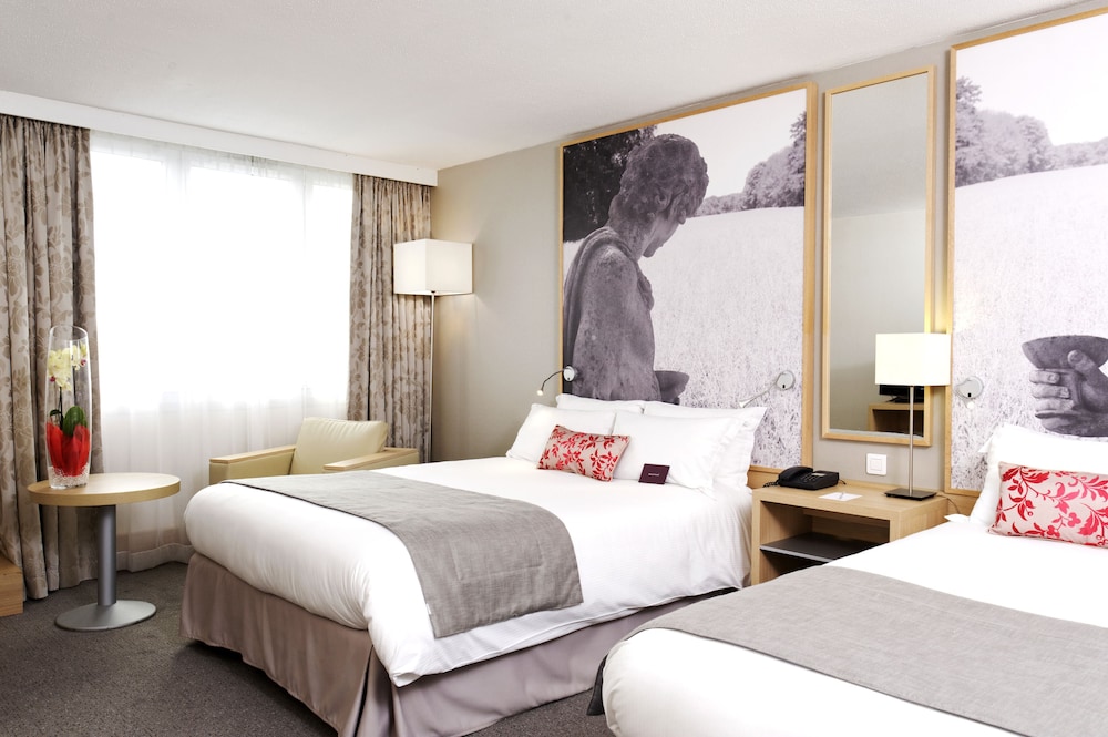 Habitación Superior - 2 camas dobles del hotel Mercure Paris Velizy. Foto 1