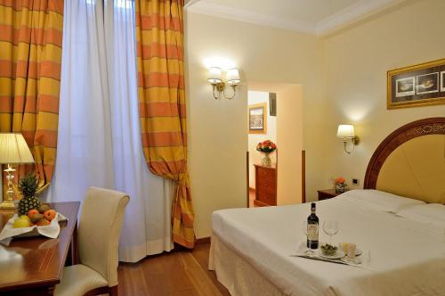 Habitación Deluxe del hotel HOMS. Foto 1