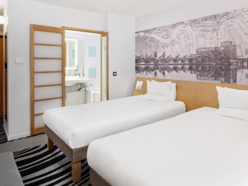Habitación Doble Estándar con 2 camas individuales del hotel Novotel London Excel. Foto 6