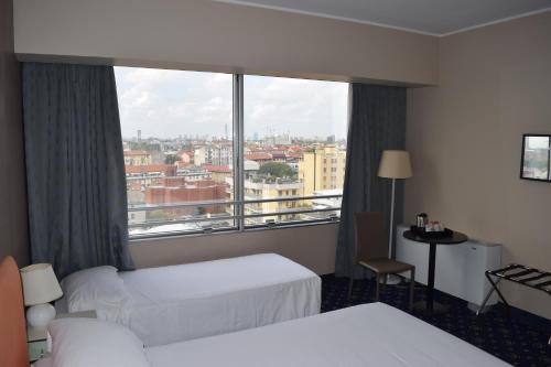 Habitación triple Vista ciudad Confort Con Vistas 3 camas individuales del hotel Hotel Blaise & Francis