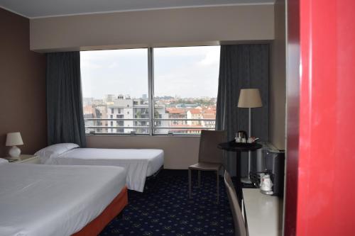 Habitación triple Vista ciudad Confort Con Vistas 3 camas individuales del hotel Hotel Blaise & Francis. Foto 3