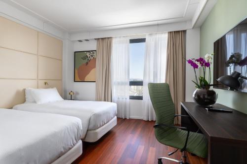 Habitación Executive - 2 camas del hotel DoubleTree by Hilton Florence Metropole. Foto 7