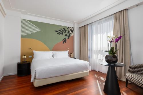 Suite Junior del hotel DoubleTree by Hilton Florence Metropole. Foto 10
