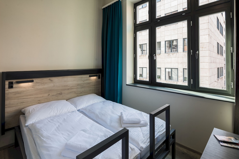 Habitación con 2 camas individuales del hotel aando Budapest City