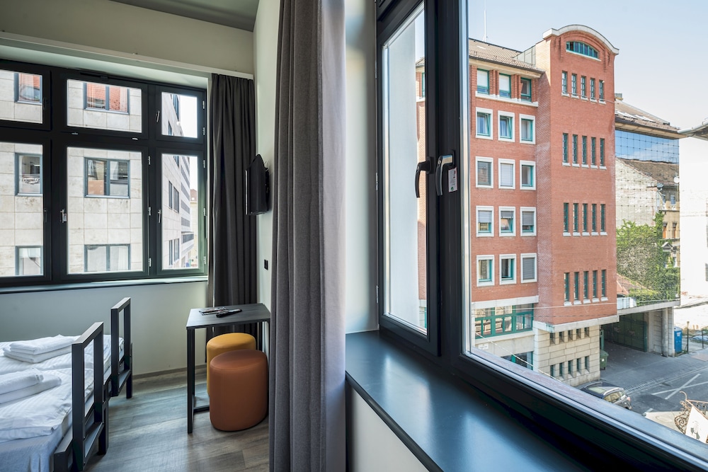 Habitación con 2 camas individuales del hotel aando Budapest City. Foto 3