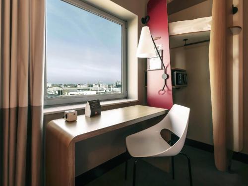 Habitación Business Â con vistas a la ciudad del hotel Ibis Amsterdam City West. Foto 1