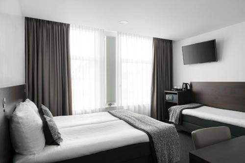 Habitación Triple del hotel City Garden Amsterdam