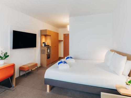 Habitación Executive del hotel Novotel Venezia Mestre Castellana. Foto 17