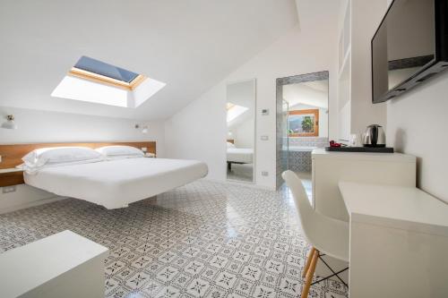 Suite Deluxe con bañera de hidromasaje del hotel Nice. Foto 5