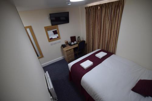 Habitación Individual del hotel PremierLux Serviced Apartments. Foto 7