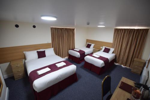 Habitación Familiar del hotel PremierLux Serviced Apartments. Foto 1