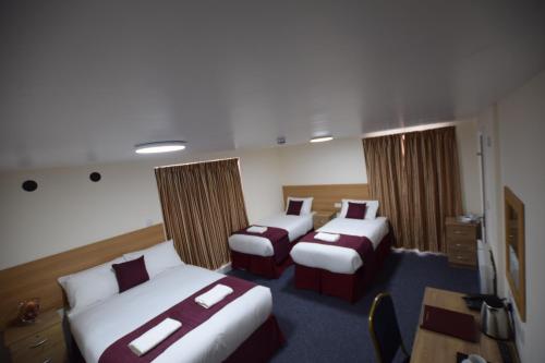 Habitación Familiar del hotel PremierLux Serviced Apartments. Foto 6