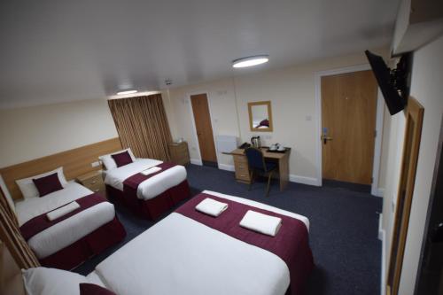 Habitación Familiar del hotel PremierLux Serviced Apartments. Foto 8