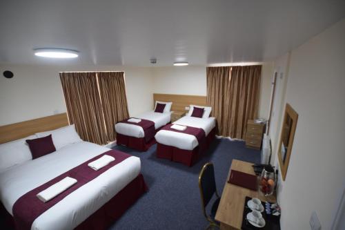 Habitación Familiar del hotel PremierLux Serviced Apartments. Foto 9