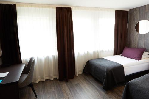 Habitaciones Familiares comunicadas (estándar) del hotel Fosshotel Husavik. Foto 1