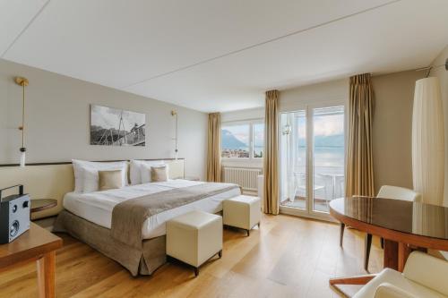 Suite Mona con vistas al lago y balcón del hotel Mona Montreux