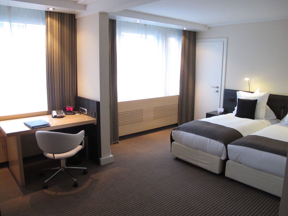Habitación estándar, 2 camas individuales del hotel Crowne Plaza Zürich, An Ihg. Foto 1