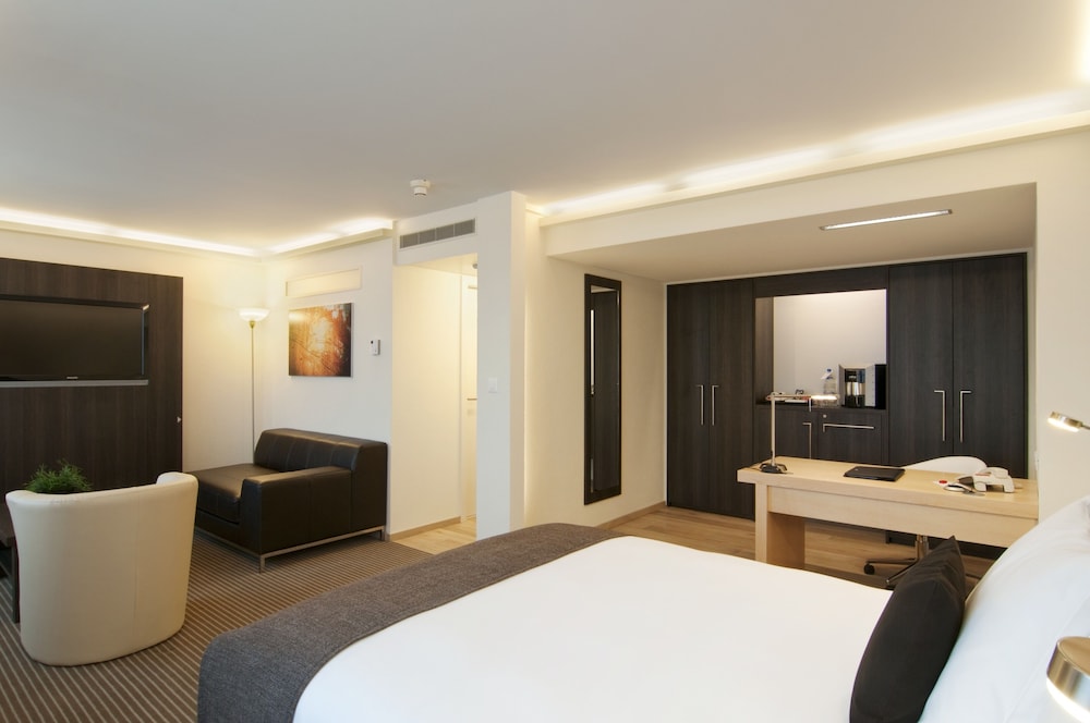 Suite junior, 1 cama de matrimonio del hotel Crowne Plaza Zürich, An Ihg. Foto 3