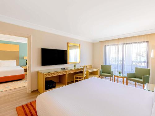 Habitación Comunicada Familiar del hotel Movenpick Resort Petra. Foto 2