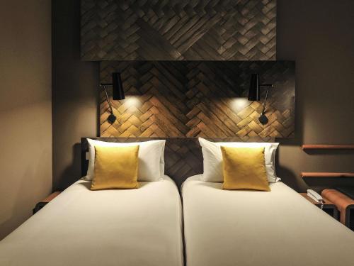 Habitación Sweet Room by ibis con dos camas individuales del hotel Ibis Casa-voyageurs. Foto 3