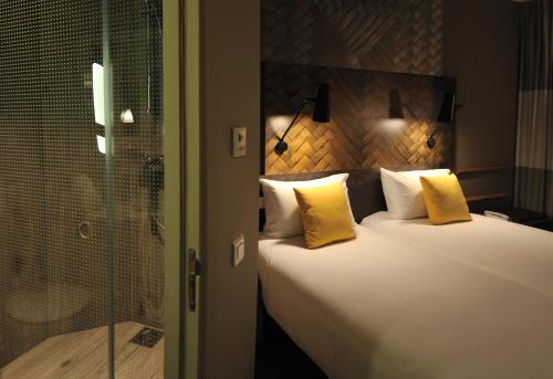 Habitación Sweet Room by ibis con dos camas individuales del hotel Ibis Casa-voyageurs. Foto 5