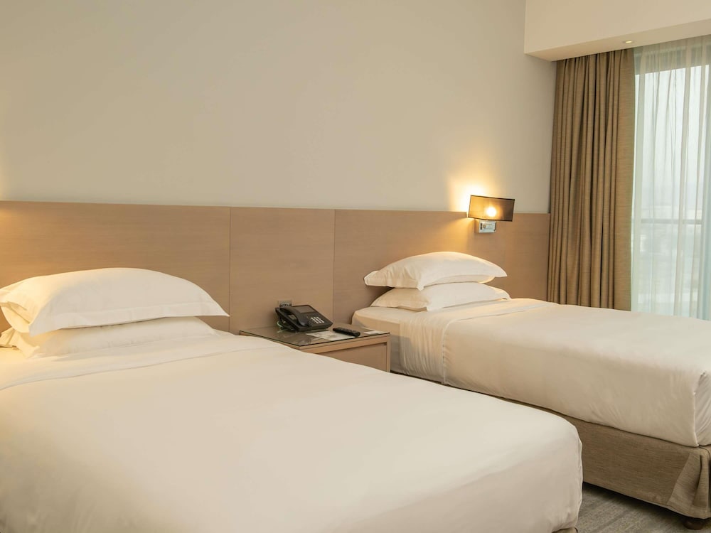 Habitación Superior Twin con 2 Camas Individuales del hotel Novotel Muscat Airport. Foto 2