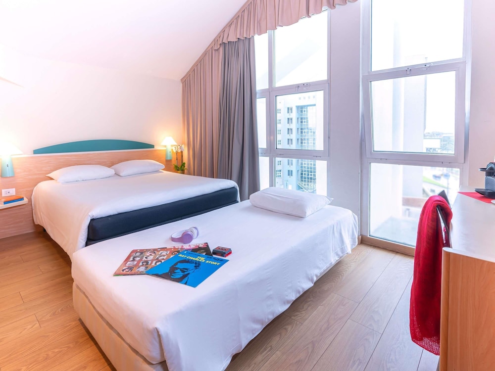 Habitación Doble Premium con 1 cama supletoria por niño del hotel Ibis Florence North Airport
