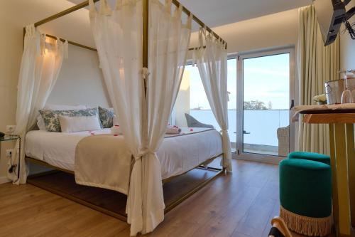 Habitación Doble Deluxe con bañera de hidromasaje del hotel Ílhavo Plaza. Foto 1