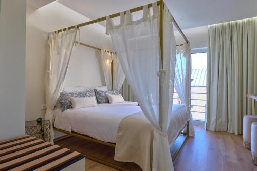 Habitación Doble Deluxe con bañera de hidromasaje del hotel Ílhavo Plaza. Foto 7