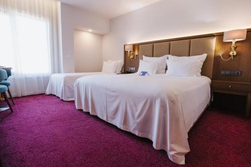 Habitación Triple del hotel Aquae Flaviae - Premium Chaves. Foto 2