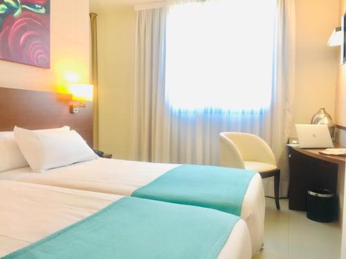 Habitación Doble - 2 camas del hotel and Spa Real Ciudad De Zaragoza