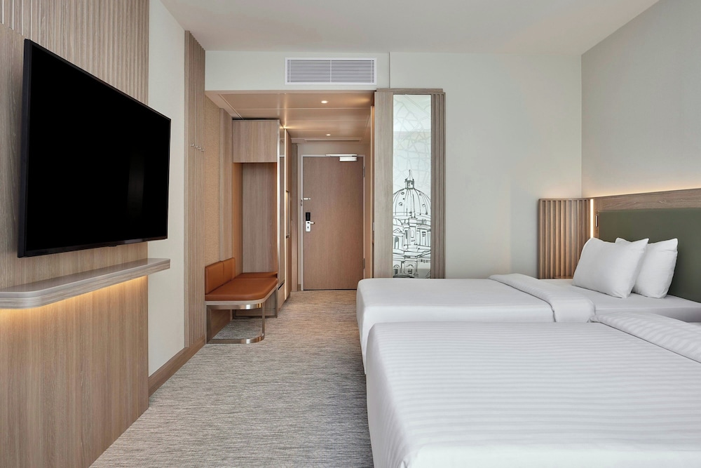 Habitación Deluxe con 2 camas individuales, 2 camas individuales del hotel COURTYARD BY MARRIOTT BERLIN CITY CENTER. Foto 4