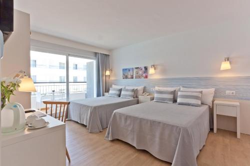Habitación Cuádruple Deluxe del hotel Pineda Splash - 30º Hotels. Foto 1