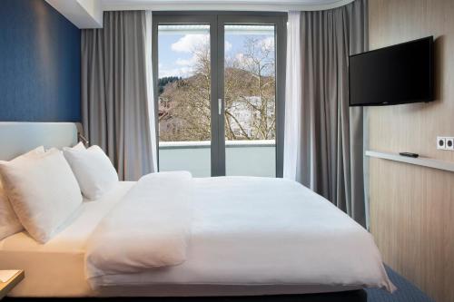 Habitación Estándar con cama grande - Planta superior del hotel Holiday Inn Express Baden-Baden. Foto 2
