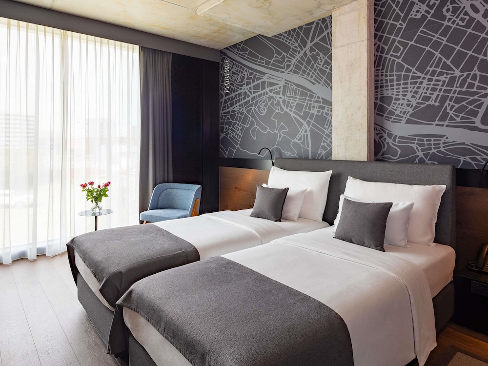 Habitación Deluxe, 2 camas individuales del hotel Mövenpick Zagreb. Foto 5