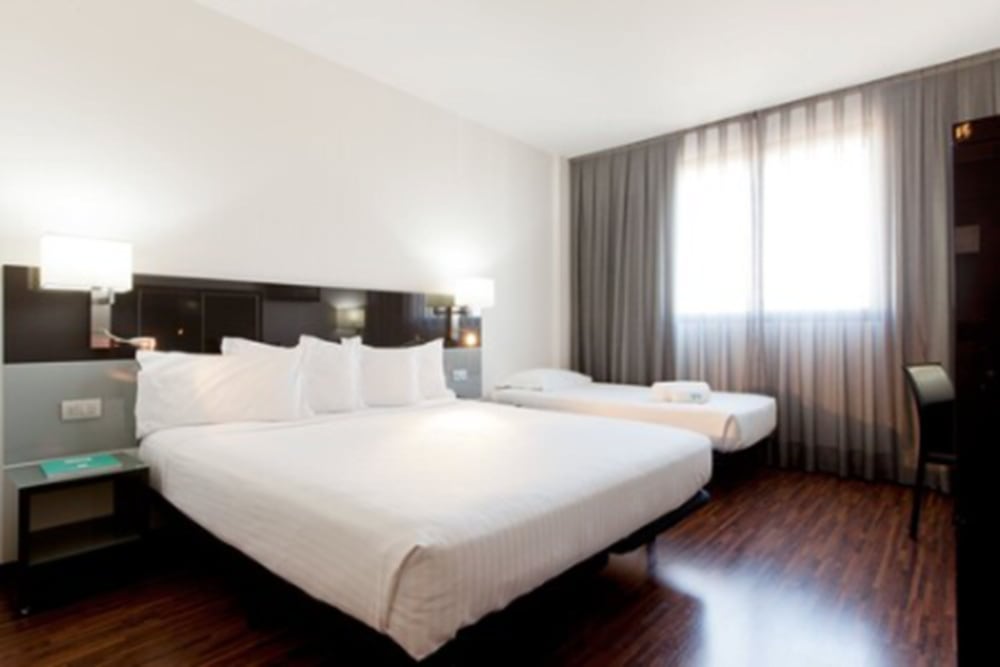 Habitación triple del hotel Ciudad De Móstoles. Foto 1