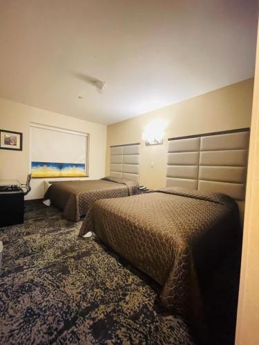 Habitación Doble Deluxe del hotel 7 Days Bronx. Foto 5