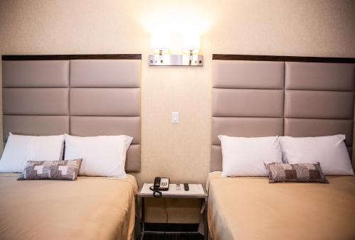 Habitación Doble Deluxe del hotel 7 Days Bronx. Foto 6