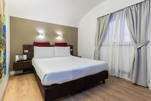 Habitación Triple del hotel Trevi. Foto 3
