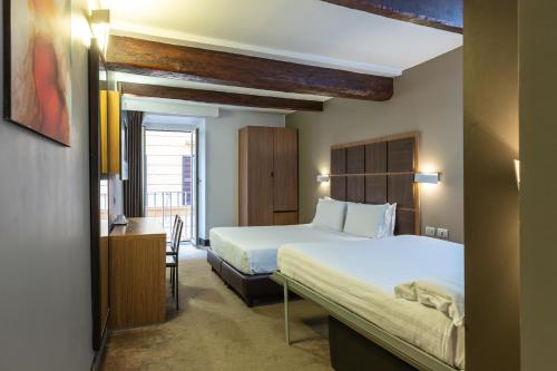 Habitación Cuádruple del hotel Trevi. Foto 3